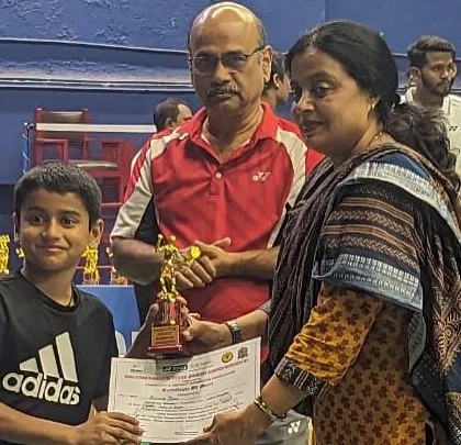 A moment of recognition for Ajinkya Desai as he receives his silver medal trophy at the state-level tournament in Thane.