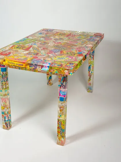 The finished 'I Spy' candy table, a vibrant and playful piece of functional art that captures the sweet memories of childhood.