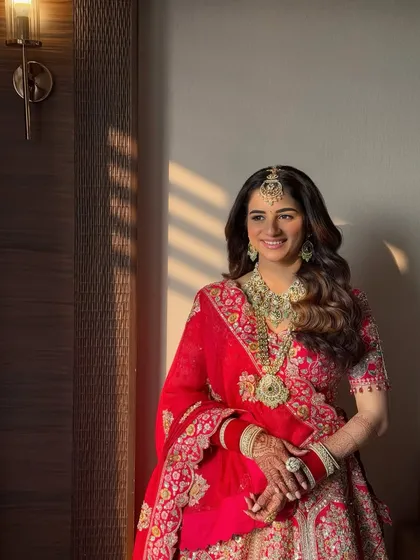 The bride bathed in the golden hour light. This shot proves that a well-done base and soft glam makeup look stunning in any lighting condition.