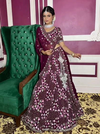This client chose a gorgeous wine-coloured lehenga with a unique geometric pattern in shades of pink and silver. It’s a modern and artistic design that is sure to turn heads.