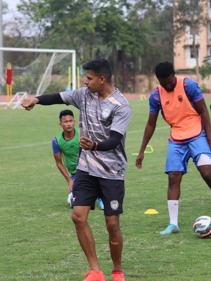 Demonstrating a movement pattern to the players. I believe in showing, not just telling, to ensure exercises are performed correctly.