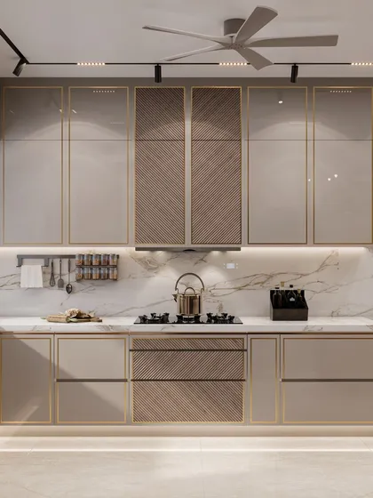 A look at a modern minimalist kitchen from an upcoming Gurugram project. The design features sleek PU and veneer cabinetry with elegant golden profiles, a marble backsplash, and integrated appliances, demonstrating our ability to create highly functional and luxurious culinary spaces.