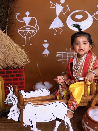 A playful moment on the bullock cart. This setup is designed to be interactive and fun for the child, allowing us to capture their natural curiosity and joy.