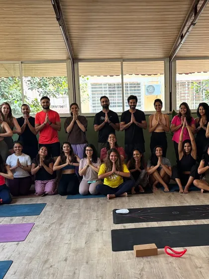 Gratitude for our growing tribe. A beautiful moment captured with our community after a fulfilling group yoga session, all centered and connected.