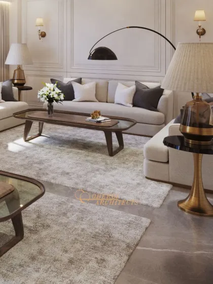 The layout features multiple seating areas, defined by soft rugs over a marble floor, creating an expansive yet intimate environment.