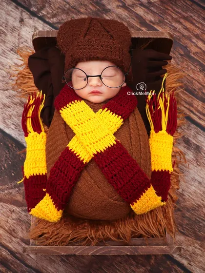 For the family that loves magic, I bring the world of Harry Potter to the studio. This little wizard is all ready for his journey, complete with a Gryffindor scarf and glasses, showing how we can personalize a shoot around your favorite stories.