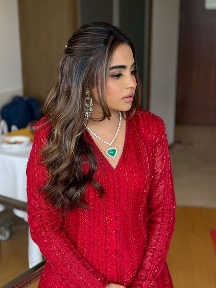 A side profile showing the beautiful waves and highlights in her hair.