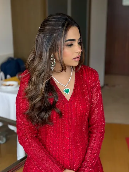 A side profile showing the beautiful waves and highlights in her hair.