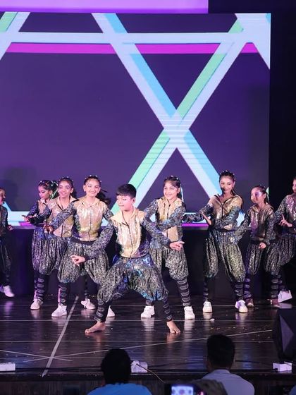 The dancers strike a pose in their stylish costumes for the "Jhoome Jo Pathaan" act, a crowd favorite at the annual show.