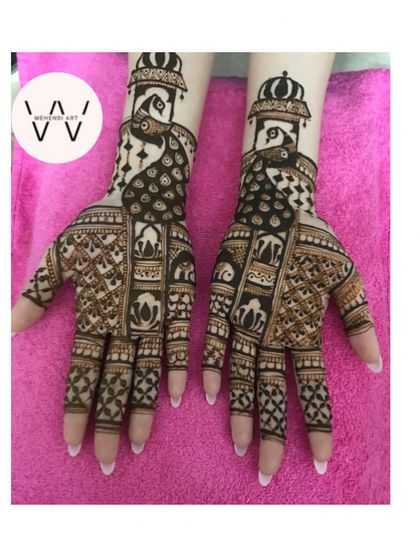 A royal-themed design for a bridesmaid, with peacocks and a crown-like dome.