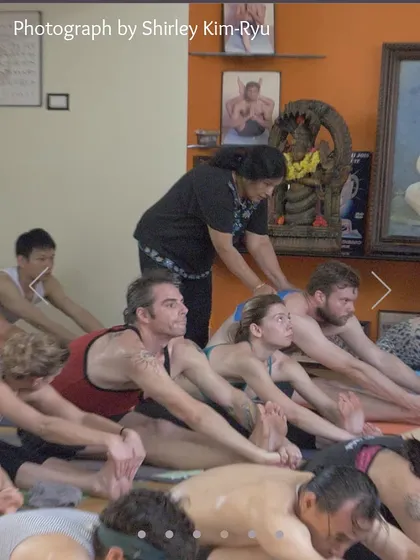 A teacher provides adjustments and guidance that you cannot get from a video. This hands-on approach is a hallmark of the Mysore style of teaching.