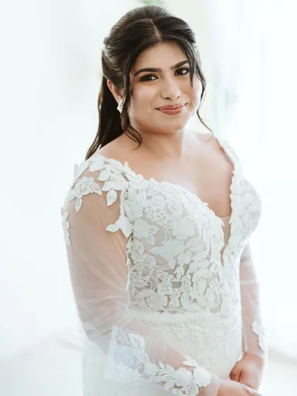 A simple, elegant portrait of the bride, her natural beauty shining through.