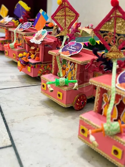 Celebrate the spirit of Lohri with these unique, handcrafted truck-themed 'mithai' boxes. They are a fun and festive way to gift sweets during the harvest festival.