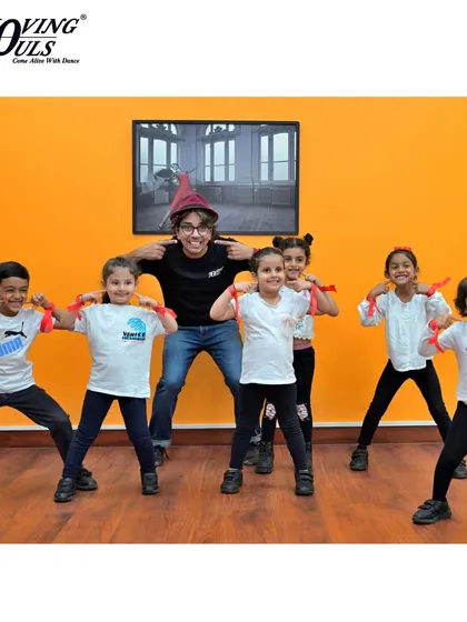 All smiles and silly faces with our kids' dance crew. These classes are as much about making friends as they are about learning steps.