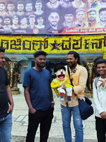Another great shot with fans in front of the massive posters for 'The Devil'. The atmosphere was electric, and my puppet Lucky was enjoying all the attention.