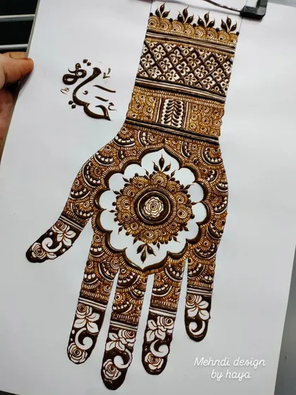 Another shot of the completed mandala design, showcasing the intricate bands on the wrist.