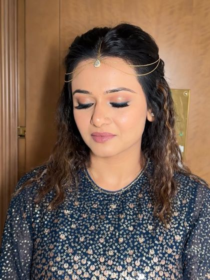 A detailed shot of the eye makeup for the Arabian nights theme. I used soft, shimmery shadows and a sharp liner to create a defined but not heavy look.