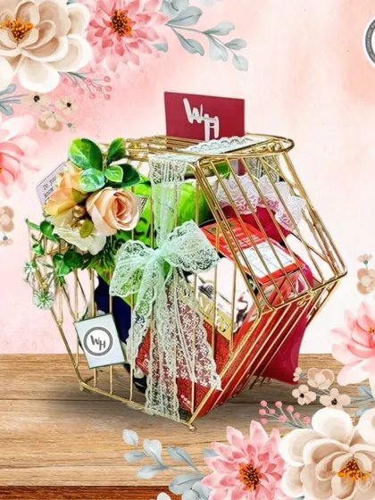 Another view of the custom-designed gold hexagonal wire basket. This angle shows how the items are artfully arranged inside, creating a gift that is both beautiful and full of delightful surprises.