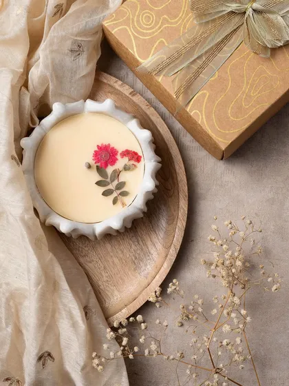 Another look at my pressed flower marble urli candle, shown here with its elegant gift box. It's a gift that is sure to be cherished.