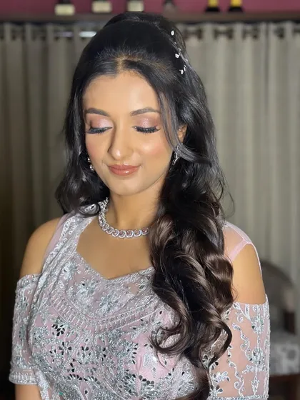 Pooja's sangeet look was soft, romantic, and so pretty. I used pink and mauve tones to create this dreamy makeup look.