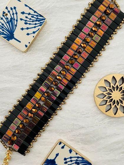 A detailed shot of a lightweight, handcrafted bracelet made from Japanese beads, a perfect example of modern accessory design.