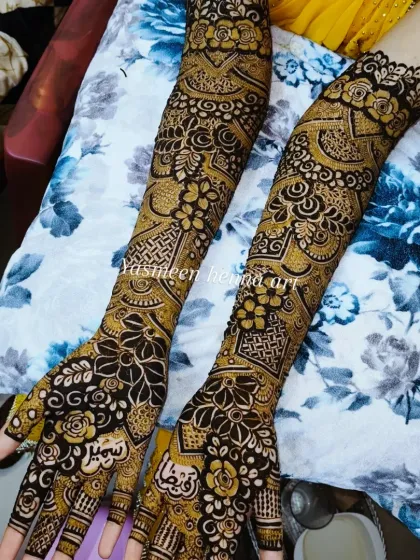 Faiza's mehndi journey, from the fresh paste to the final look. This design features a mix of geometric and floral patterns, with names personalized on the palms.