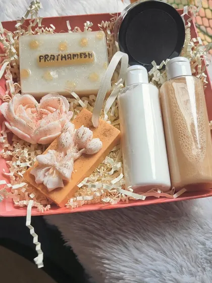 I also create sophisticated gift hampers for him. This set features a personalized name soap, honey bodywash, lavender body lotion, bath salts, and a scented candle for a complete grooming experience.