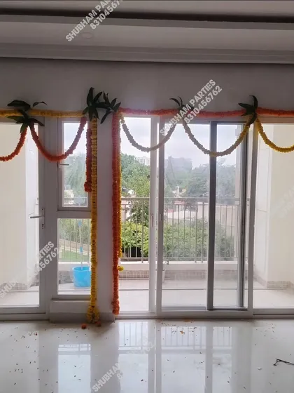 Simple and elegant marigold garlands to decorate doors and windows for a festive look.