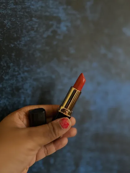 A beautiful coral-red shade that brightens up the face instantly. Like all my lipsticks, this one is handmade with lots of love.