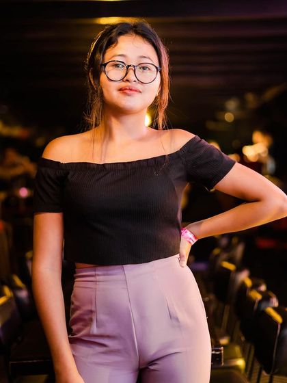 A guest posing at the bar.