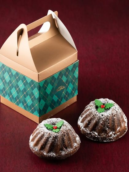 For a classic Christmas treat, our rich and fruity rum-soaked Plum Cakes are a must. This gift box of two mini plum cakes is perfect for sharing.