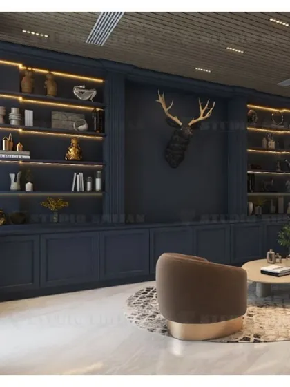 Another look at the custom-built library and display unit, with warm LED strip lighting highlighting the decor items on the shelves.
