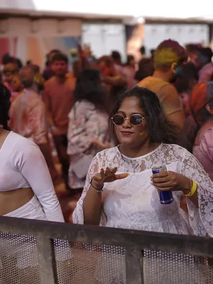 Guests enjoying the vibe from behind the barricade at the rooftop party. We ensure a comfortable and safe experience for everyone.