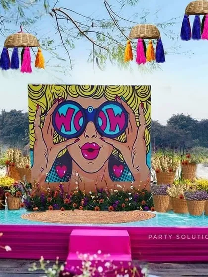 Your wedding should reflect your fun side! I designed this quirky and vibrant Mehendi stage with a pop-art backdrop and colorful hanging baskets to create a lively, high-energy photo zone that was an absolute hit with the guests.