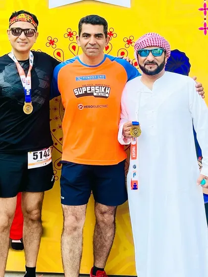 A member with his finisher medal from the Super Sikh Run. The Vaisakhi-themed event was full of energy and celebration.