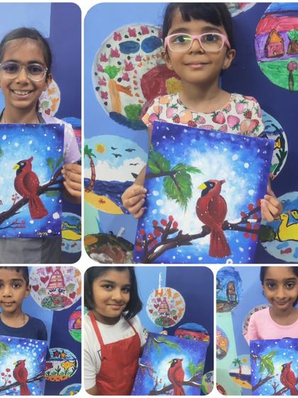 A collage of young artists with their paintings of a red cardinal bird in a snowy scene. This was from day one of our acrylics workshop, where they learned about colour blending and composition.