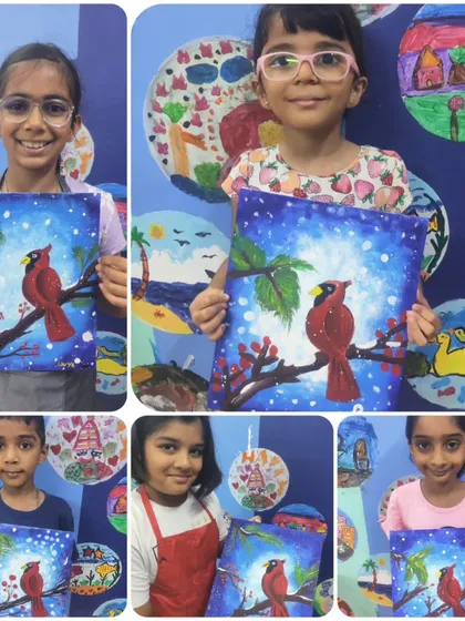 A collage of young artists with their paintings of a red cardinal bird in a snowy scene. This was from day one of our acrylics workshop, where they learned about colour blending and composition.
