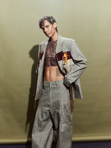 This look for the Huemn show featured a deconstructed suit with a sheer top, playing with tailoring and transparency.
