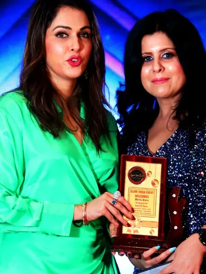 Receiving an award from the charismatic Isha Koppikar for my work. Moments like these inspire me to keep striving for excellence.