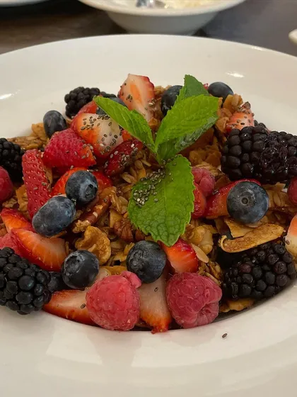 When traveling, I always look for healthy breakfast options. This bowl of mixed berries over Greek yogurt with roasted nuts was a perfect choice. It's high in protein, healthy fats, and antioxidants, and low in sugar.