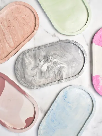Another look at the variety of our oval trinket trays. The marbling process ensures that no two trays are ever exactly alike.