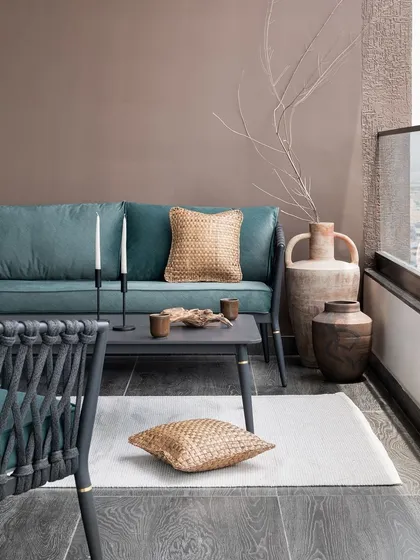 The apartment's balcony was designed as a seamless extension of the indoor space. I used comfortable outdoor furniture in calming tones, allowing the 20th-floor city skyline to be the main attraction.