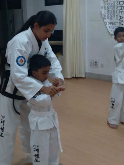 Hands-on guidance from a female instructor. We ensure our youngest students learn the correct form from the start in a nurturing environment.
