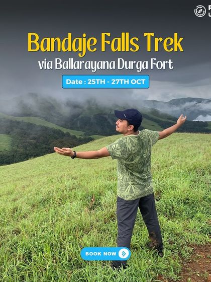 A trekker spreads his arms, taking in the stunning view from the Bandaje Falls trail.