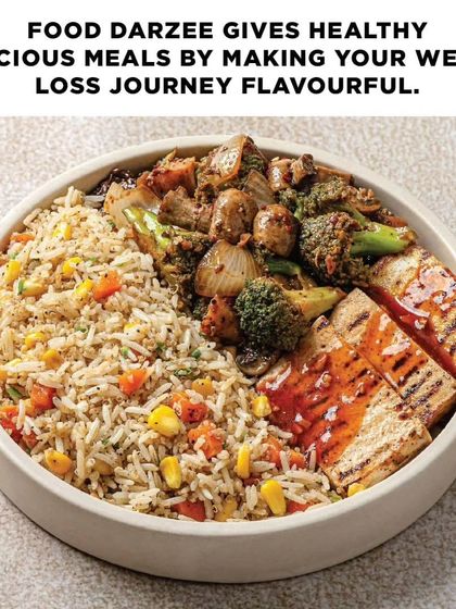 We make your weight loss journey flavorful with healthy and delicious meals like this balanced bowl of rice, grilled paneer, and veggies. It's all about finding the right balance.