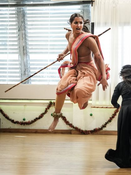 A dynamic jump captured during a 'Sitayana' rehearsal. The studio is where we build the strength and technique needed for demanding stage choreography.