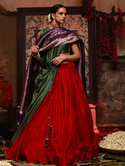 A full-length shot showcasing a beautiful color-blocked lehenga and dupatta from Soho Begum's collection.