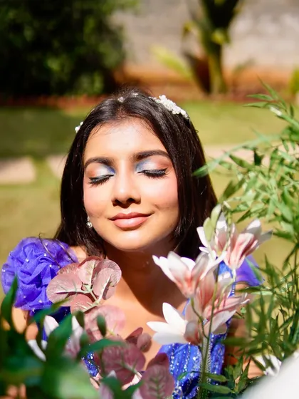 A serene close-up showing the soft blue and silver eyeshadow work. This look was all about creating a gentle radiance, perfect for a designer who wants their collection to feel both luxurious and approachable.