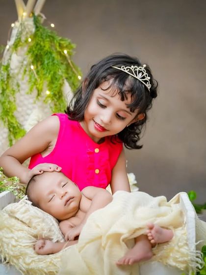 A fairytale beginning. With her little crown, this big sister is the queen of her baby brother's heart, and I love capturing that magic.