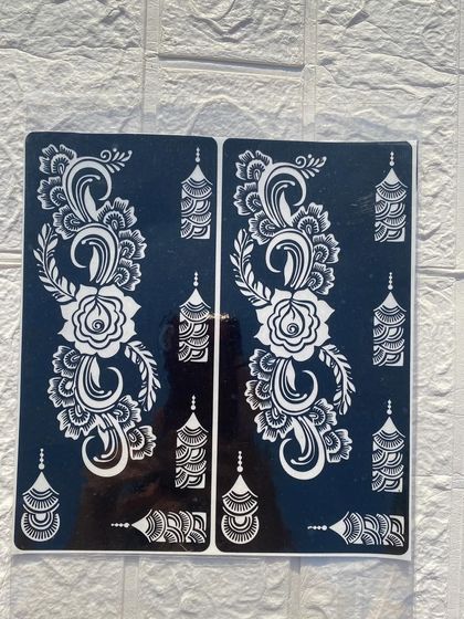 This large stencil sheet includes beautiful Arabic-style motifs and hanging "jhumka" designs, perfect for festive occasions.